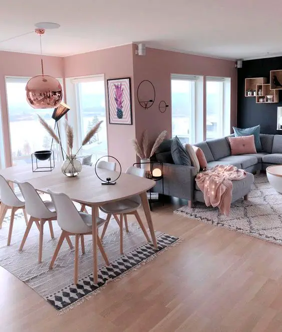 Decoração de sala de estar e jantar juntas com o mesmo estilo nos dois ambientes