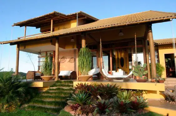 Casa com varanda tropical